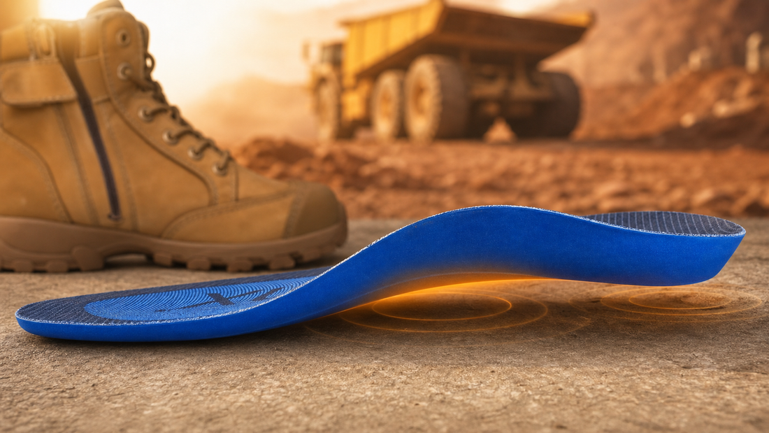 Blue ErgonX orthotic insole supporting the arch on a mining site